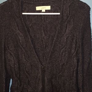 Warm knitted sweater, perfect for freezing offices!